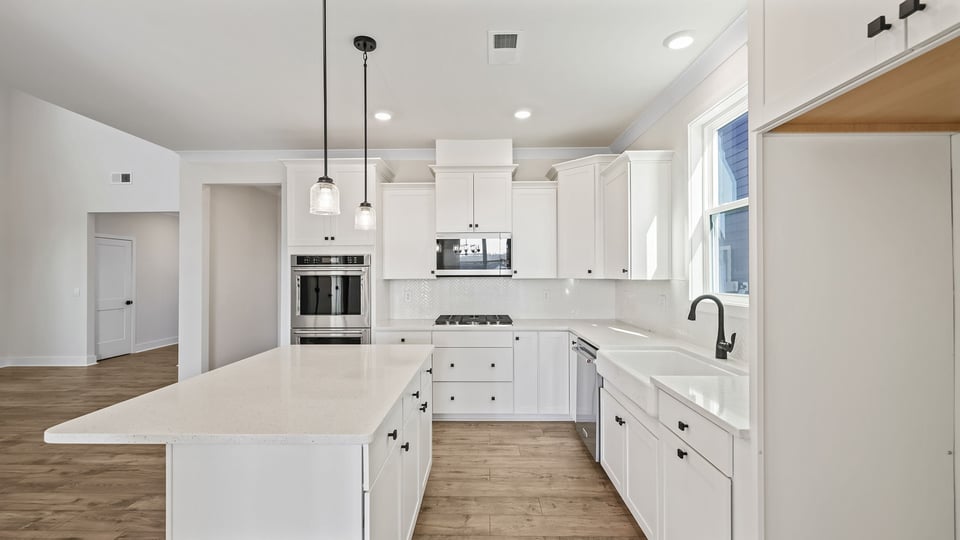 Island with quartz countertop.