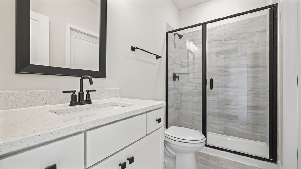 Full bathroom on the main level with walk in shower.
