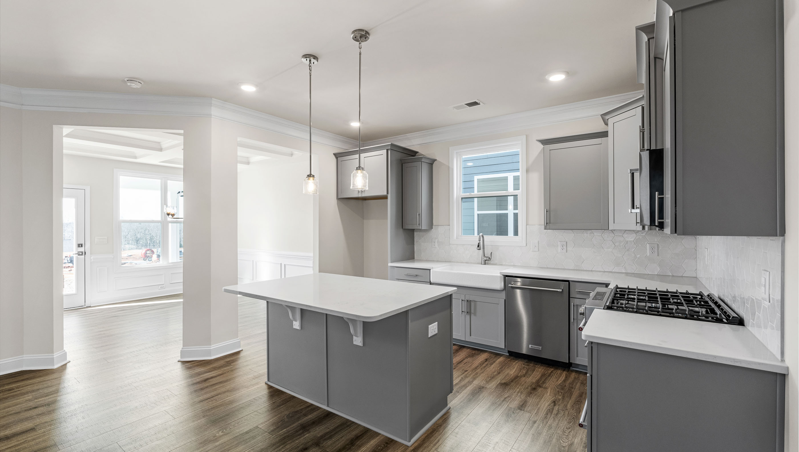 Kitchen with island and cabinets.