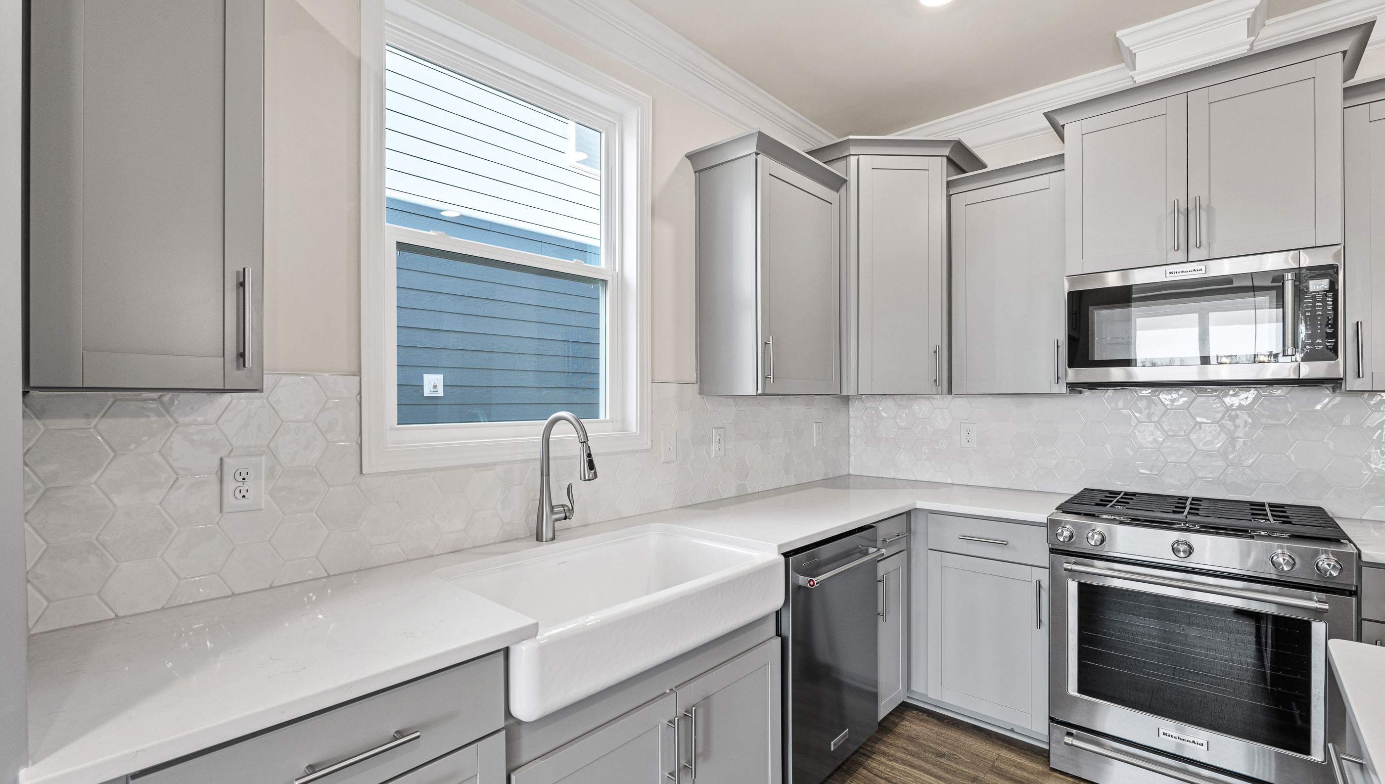 Kitchen with island and cabinets.