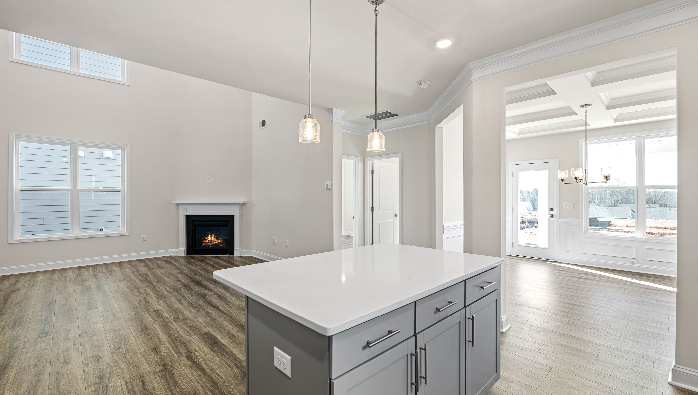 Kitchen with island and cabinets.