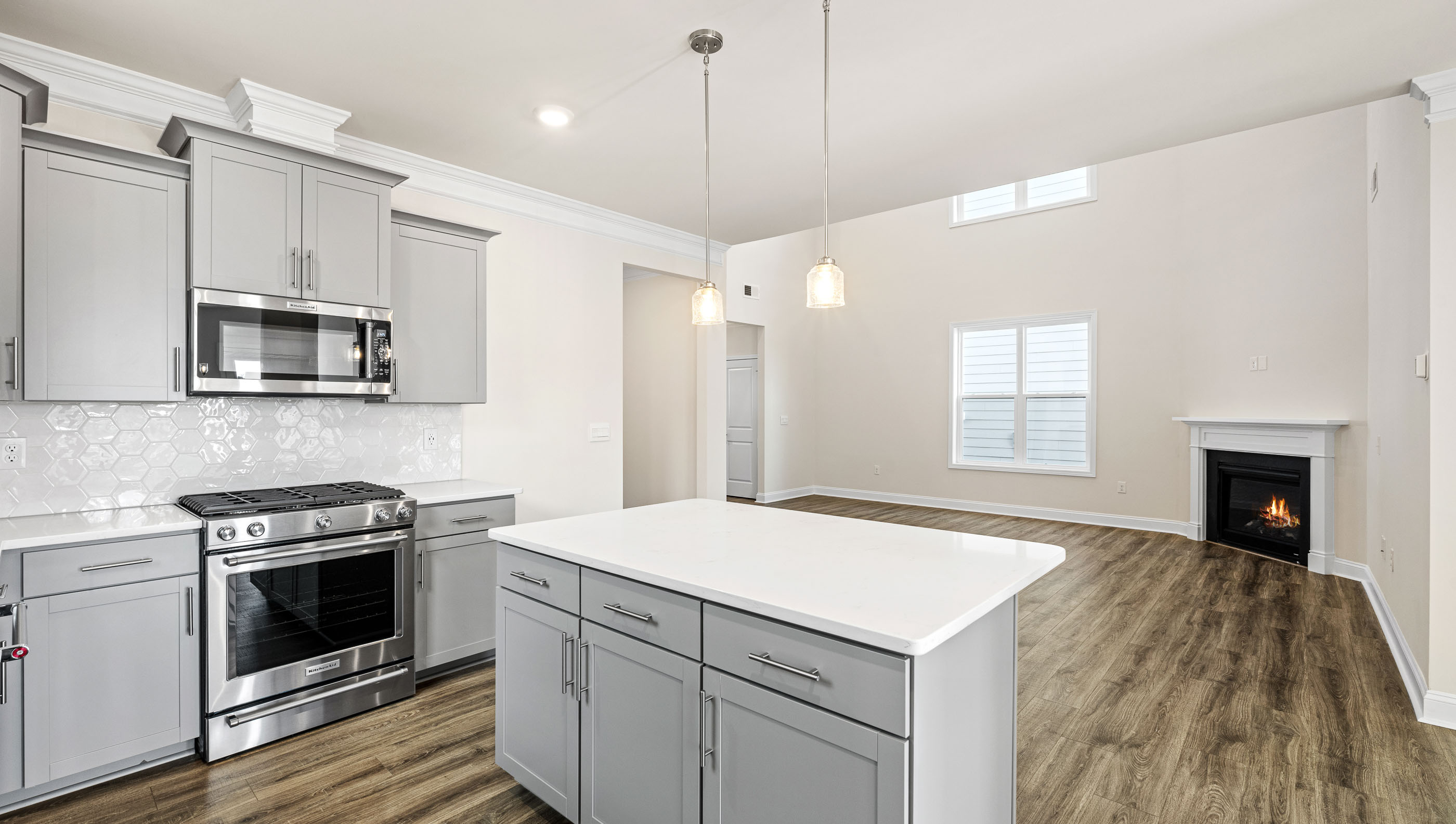 Kitchen with island and cabinets.