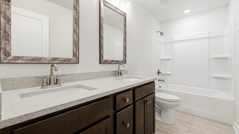 Bathroom with double vanity sinks.