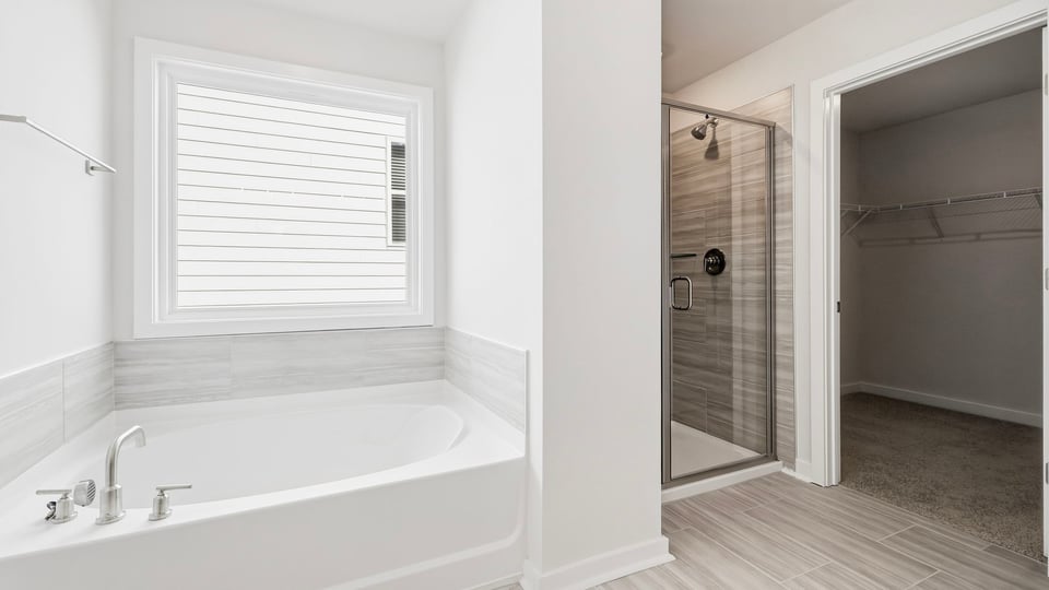 Primary bathroom with double vanity sinks.