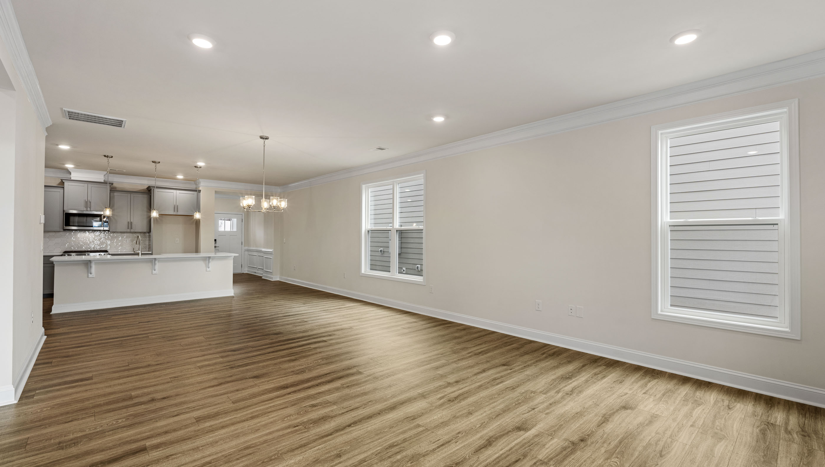 Beautiful flooring and lots of windows.