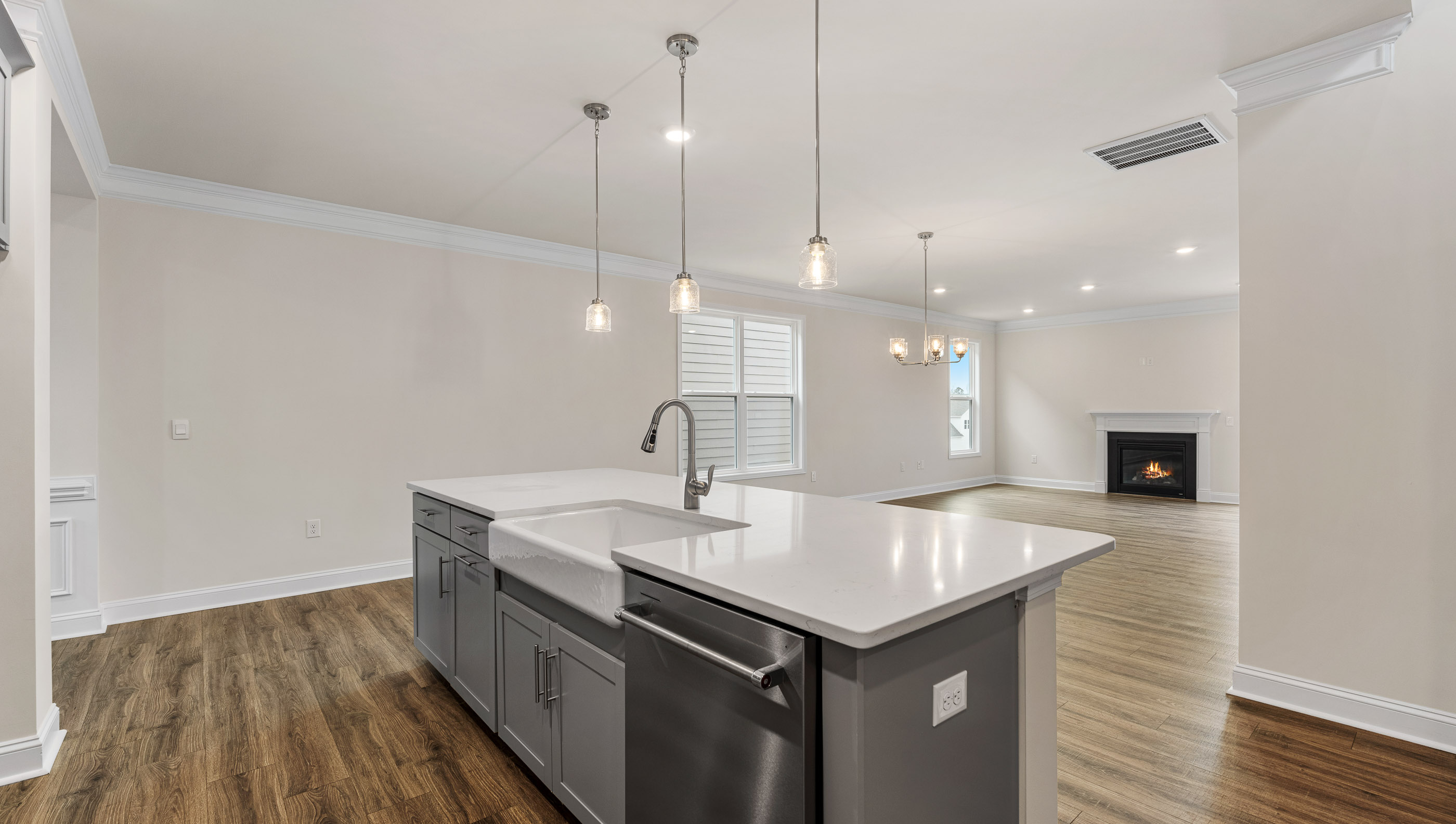 Kitchen with island and cabinets.