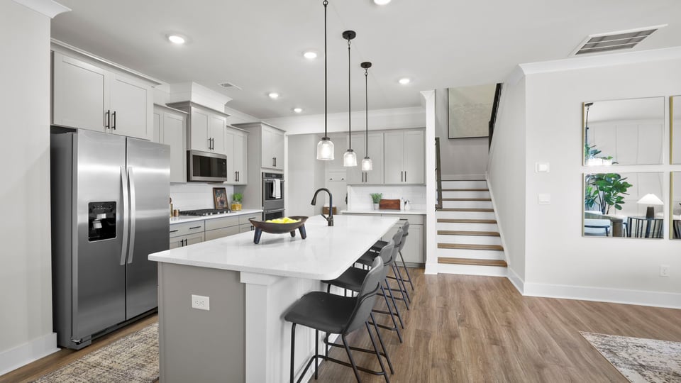 Kitchen with island and cabinets.