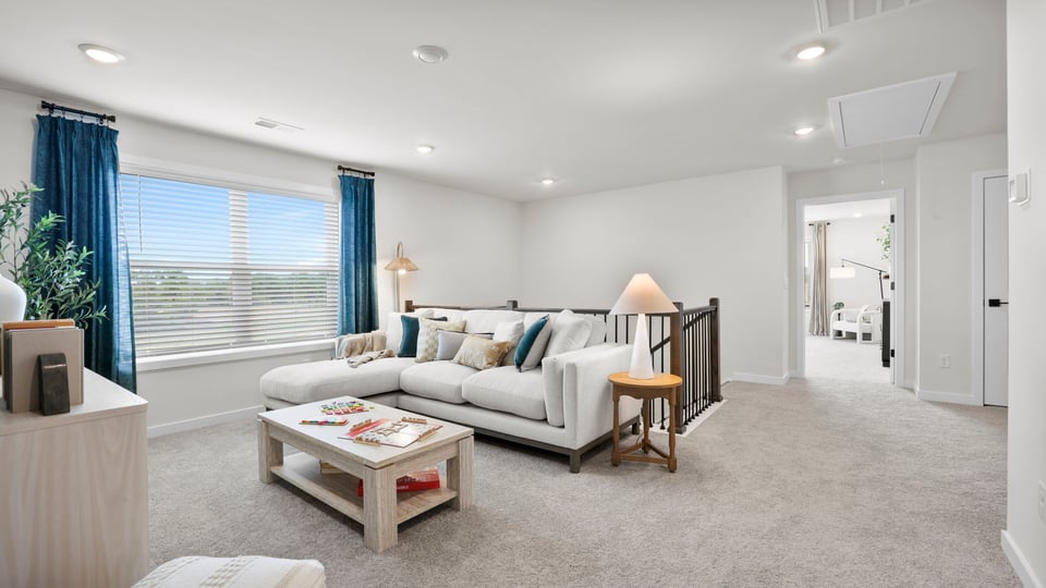 Loft area with carpet.