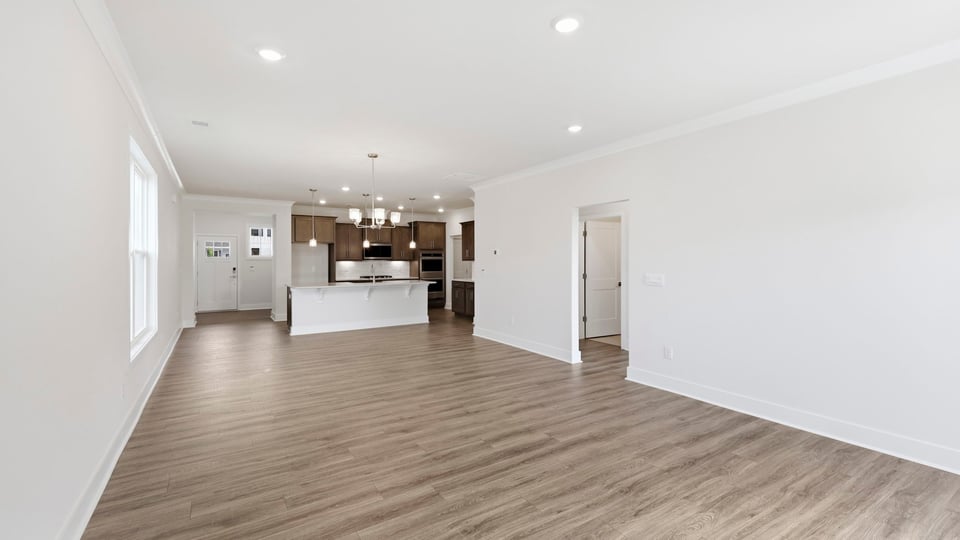 Living area with windows and fireplace.