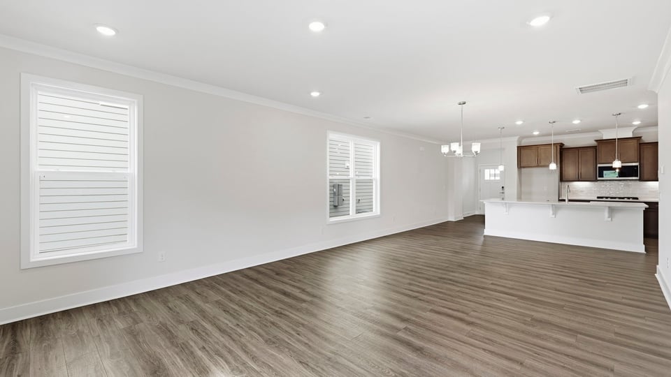 Living area with windows and fireplace.