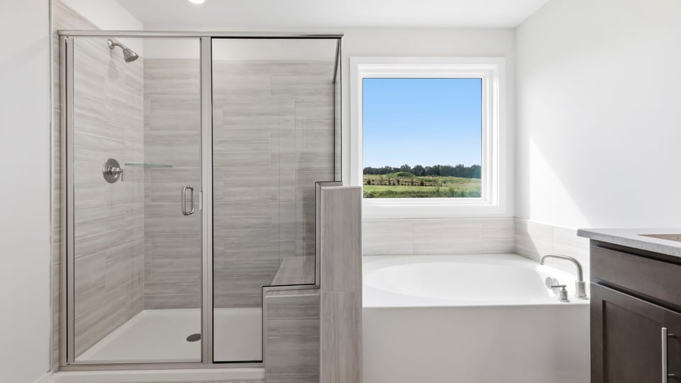 Primary bathroom with double vanity sinks.