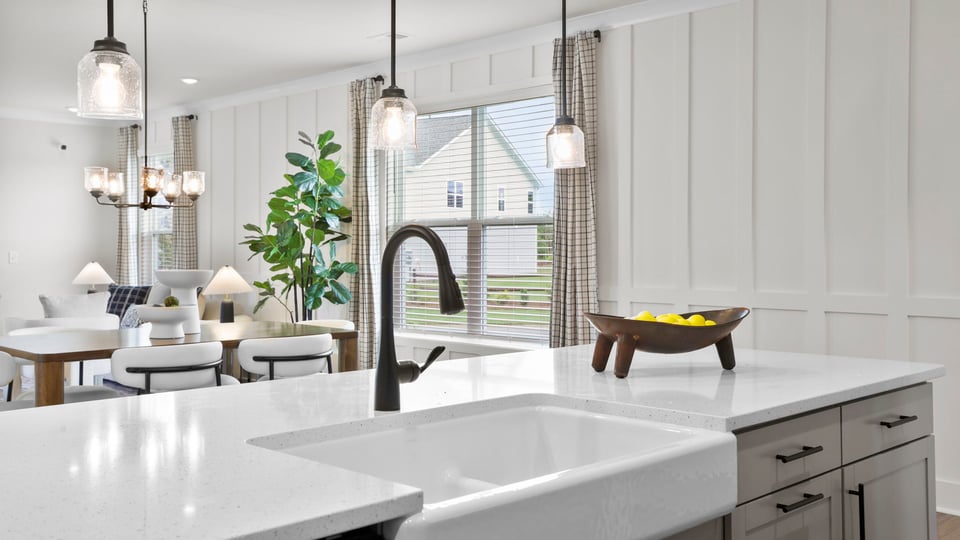 Kitchen with island and cabinets.