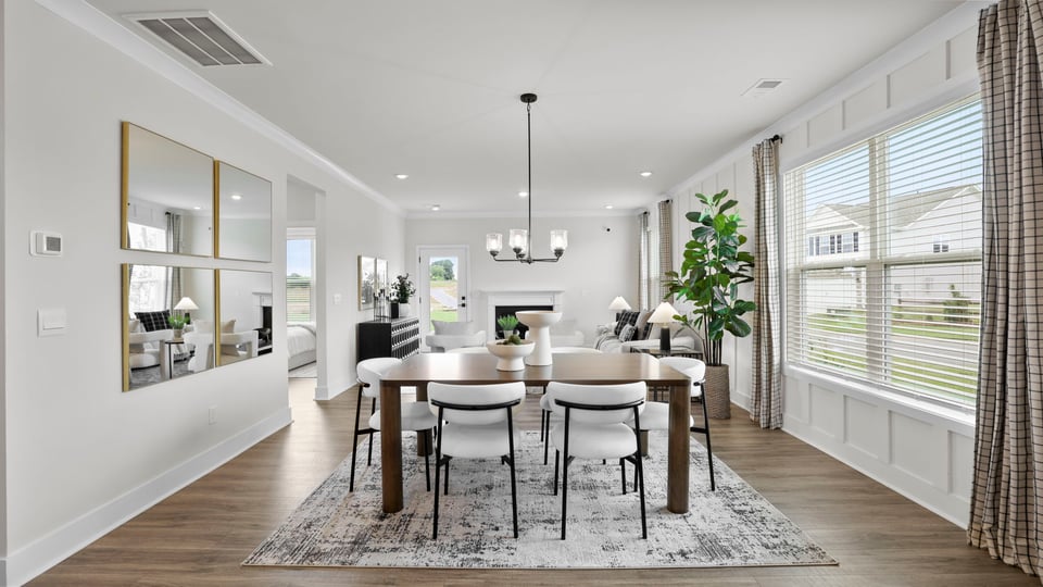 Living area with windows and fireplace.