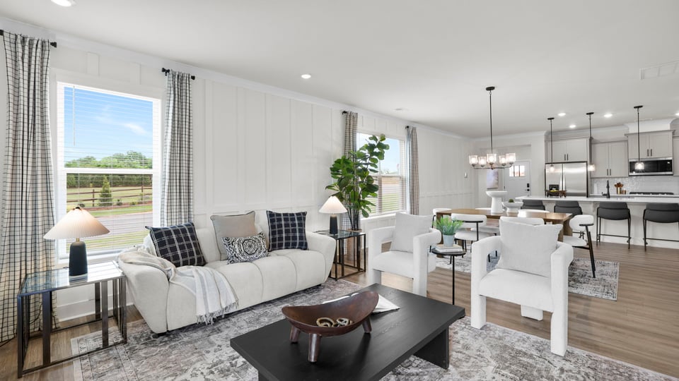 Living area with windows and fireplace.