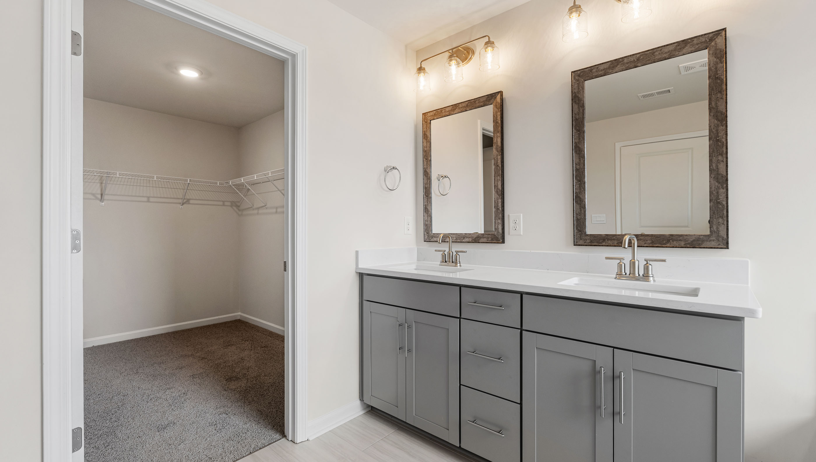 Primary bathroom with double vanity sink.