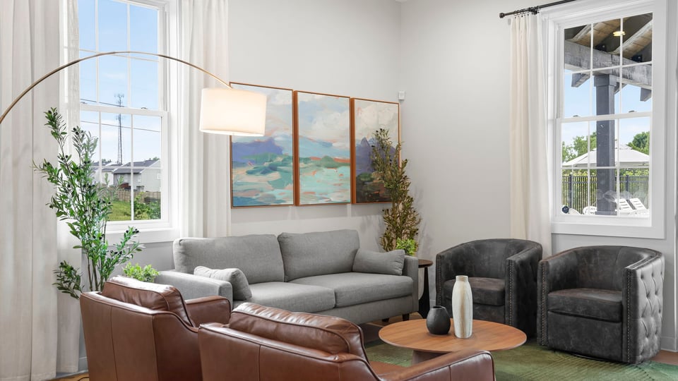 Living area of clubhouse with windows.