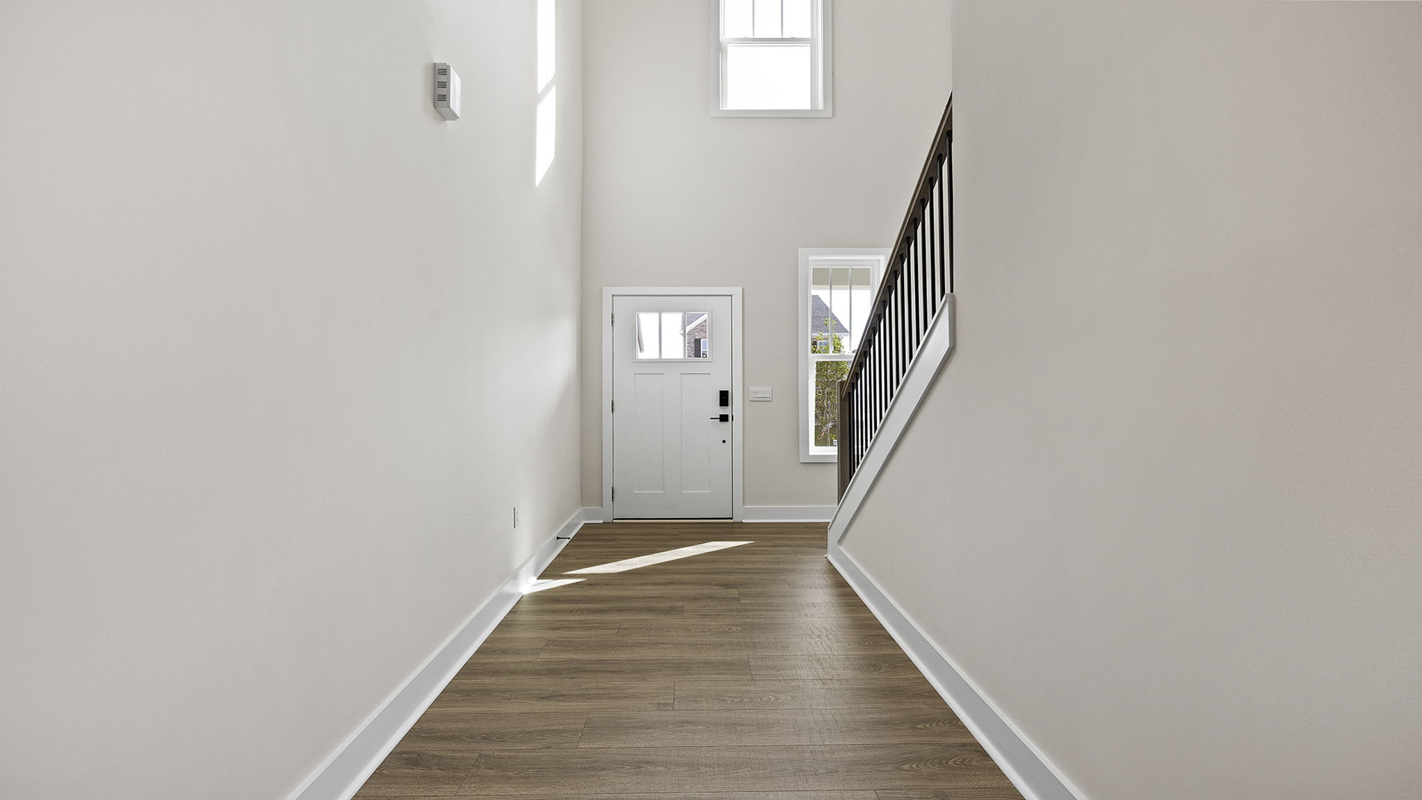 Hallway with view of rooms.