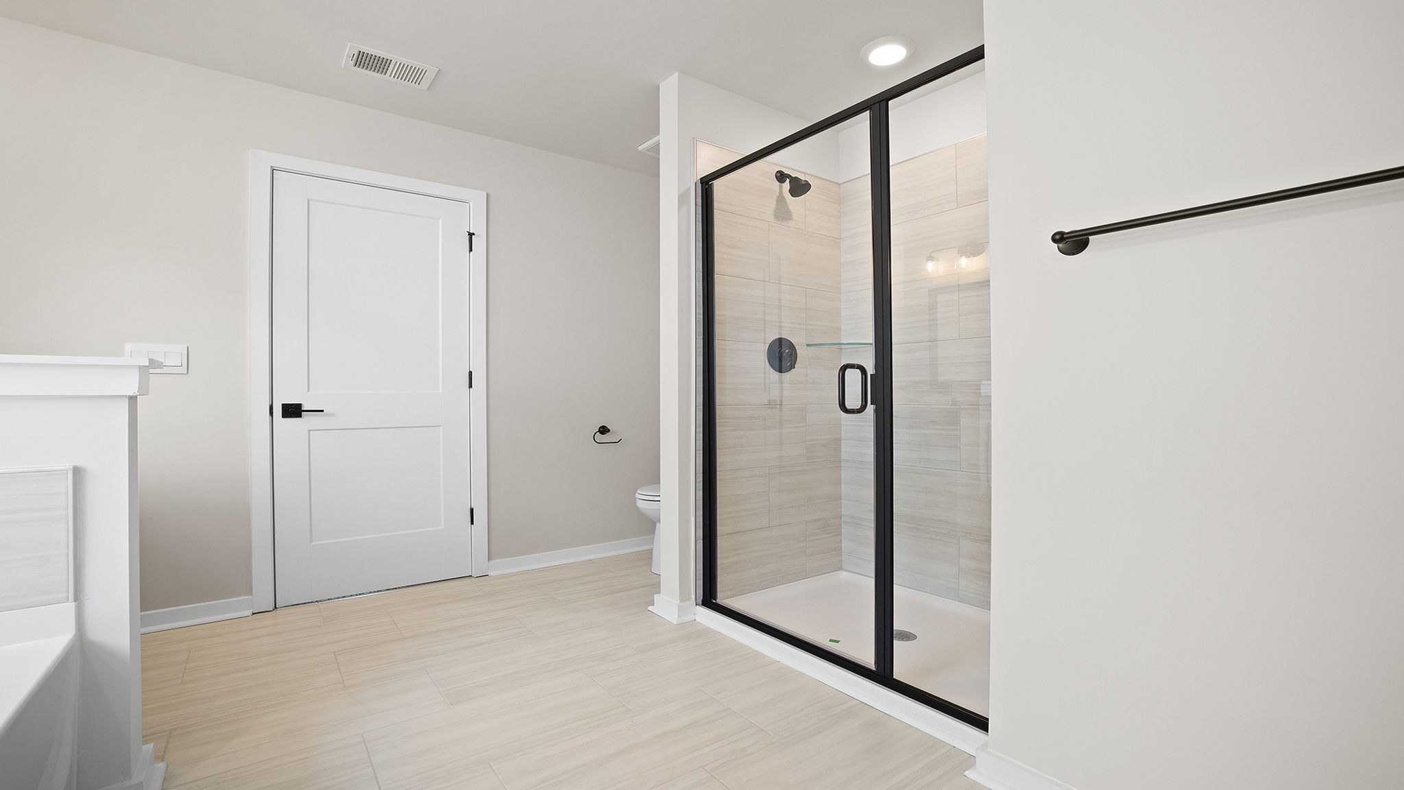 Primary bathroom with double vanity sink.