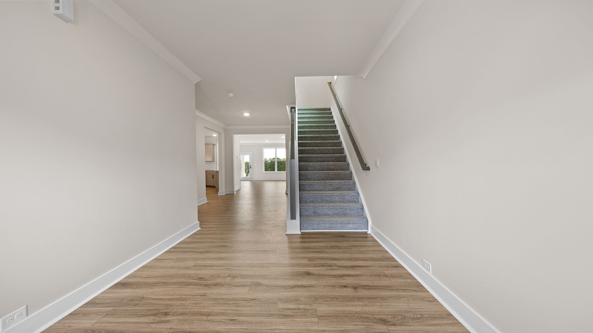 View of the foyer and stairwell to the upper level.