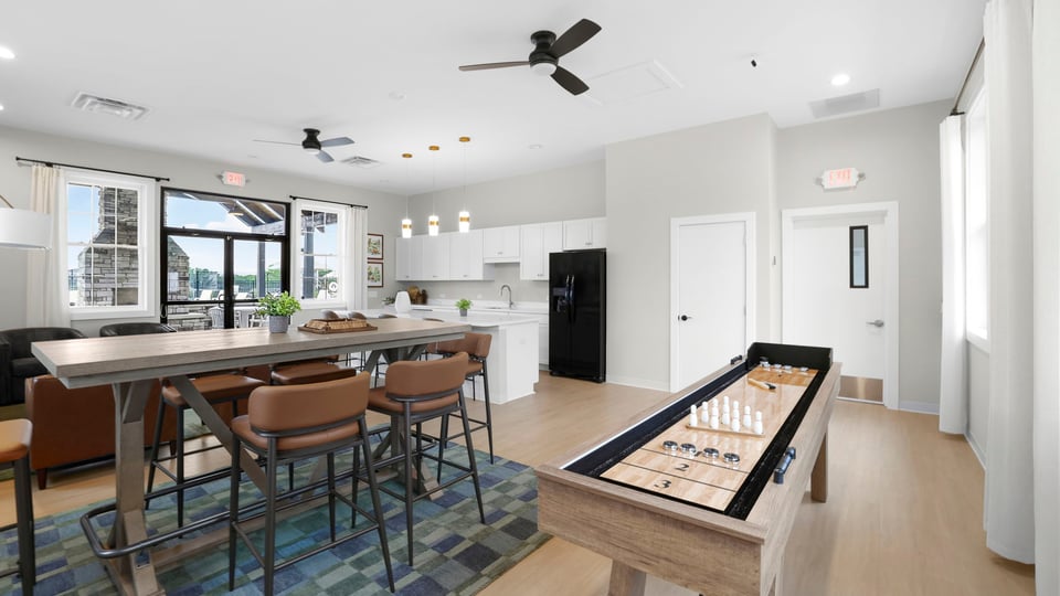 Living area of clubhouse with windows.