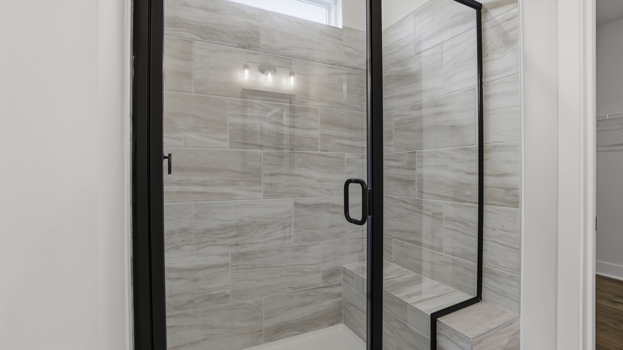 Primary bathroom with double vanity sinks.