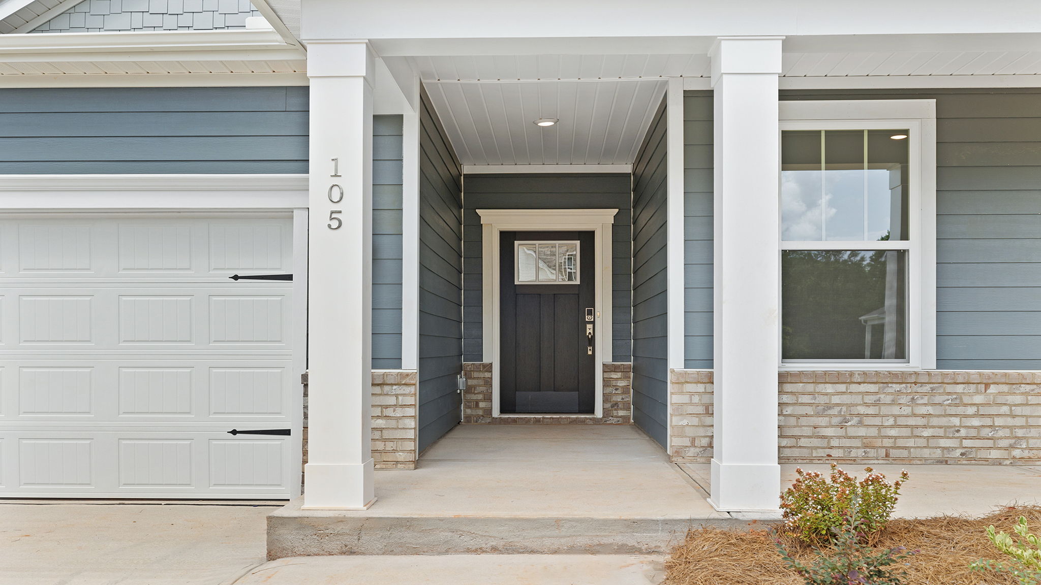 Inviting entry and front porch.