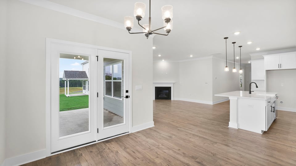 Living room with window and fireplace.