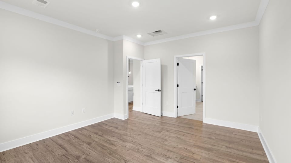 Bedroom with window and closet.