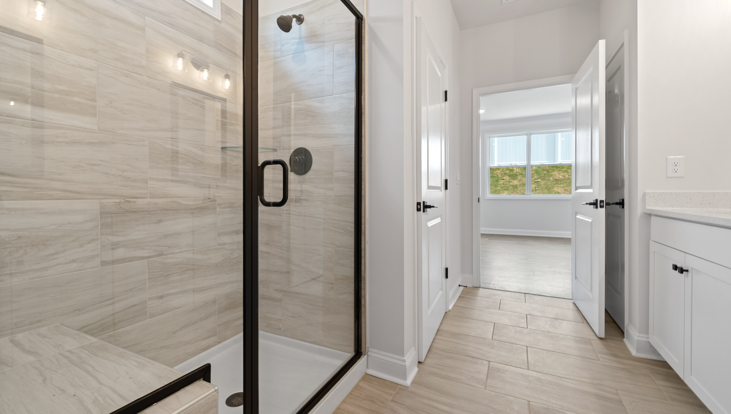 Bathroom with shower and closet.