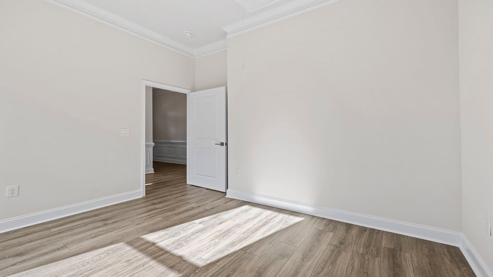 Bedroom with window and closet.
