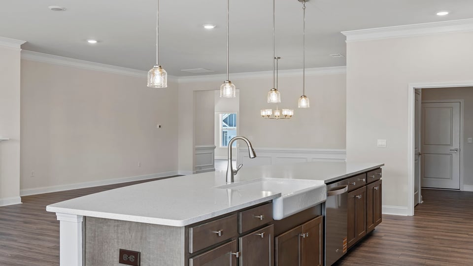 Kitchen with island and cabinets.