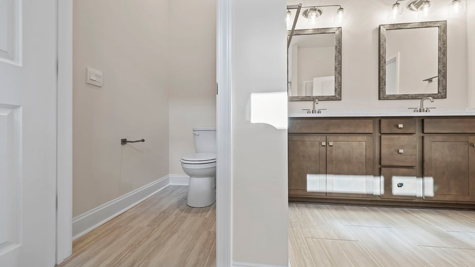 Primary bathroom with double vanity sinks.