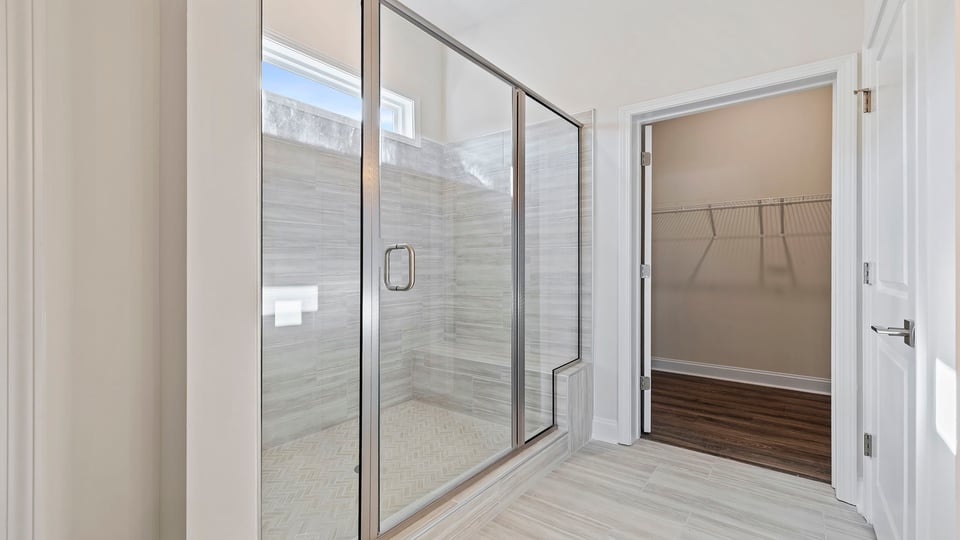 Primary bathroom with double vanity sinks.