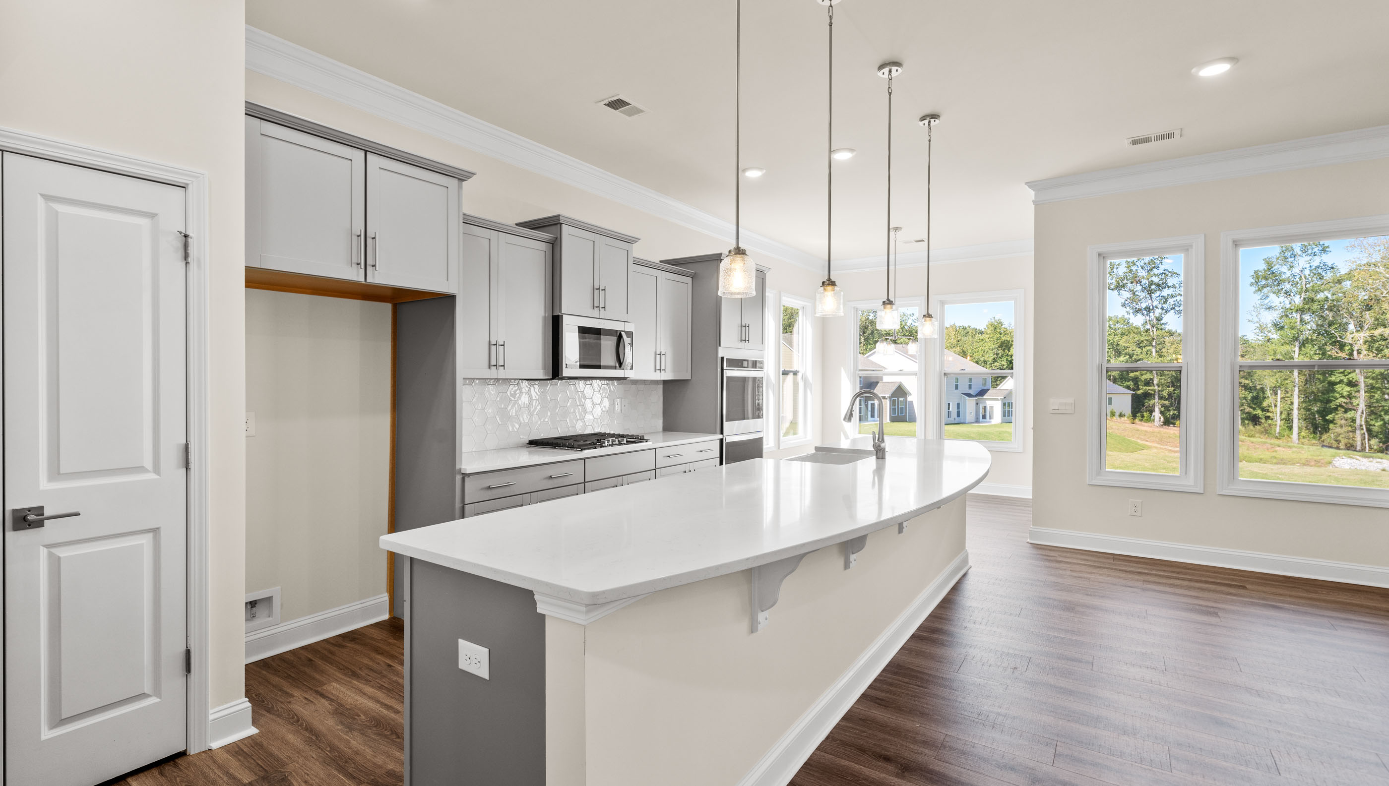 Kitchen island with quartz countertop.
