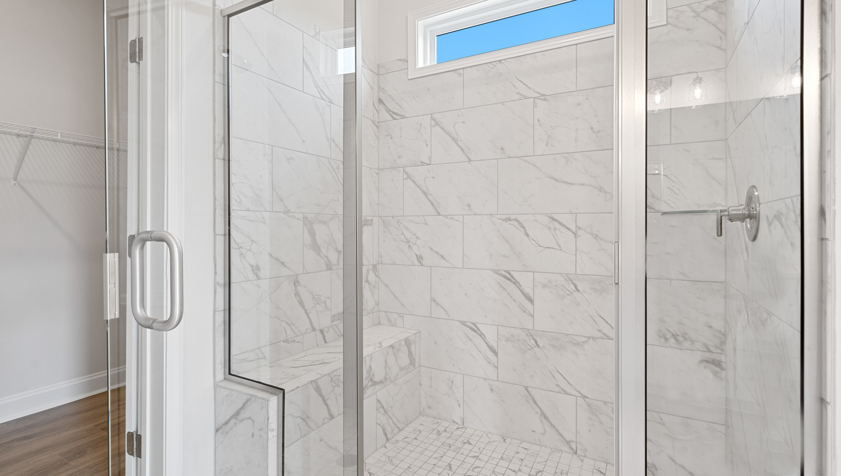 Primary bathroom with double vanity sinks.