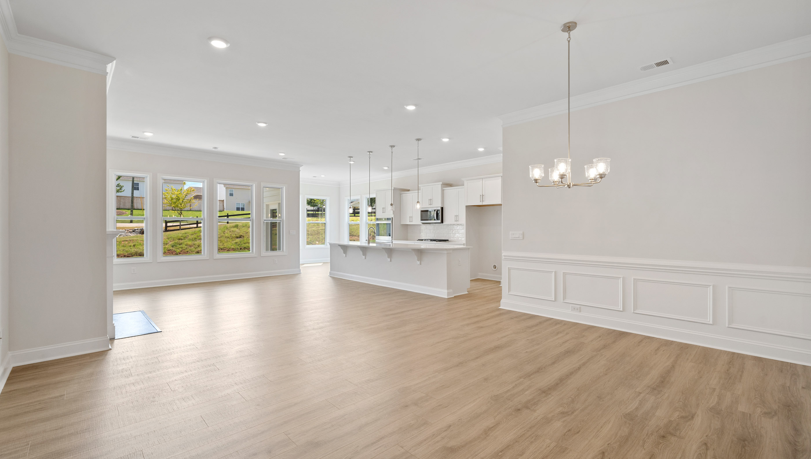 Kitchen with island and cabinets.