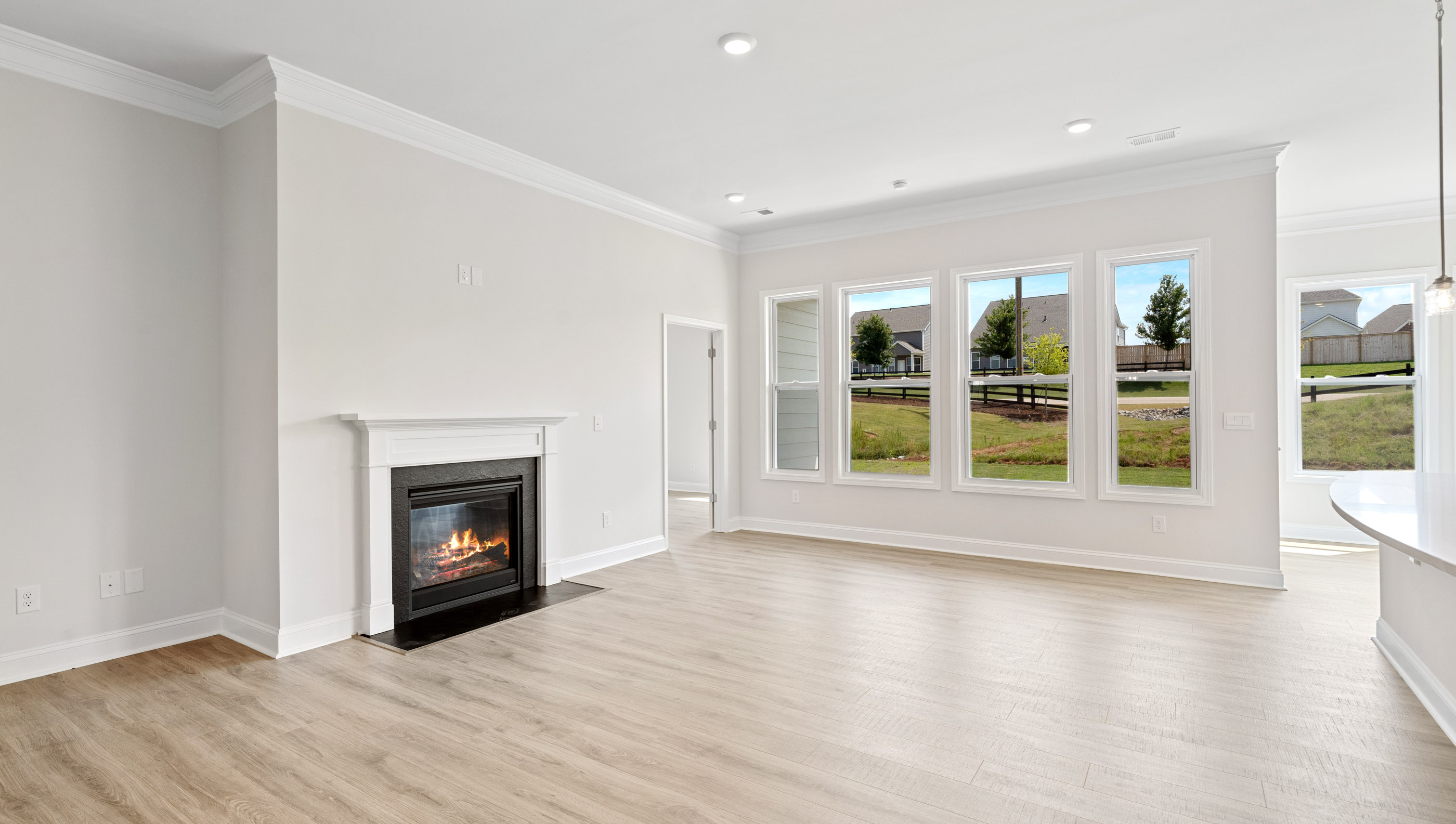 Living area with window and fireplace.
