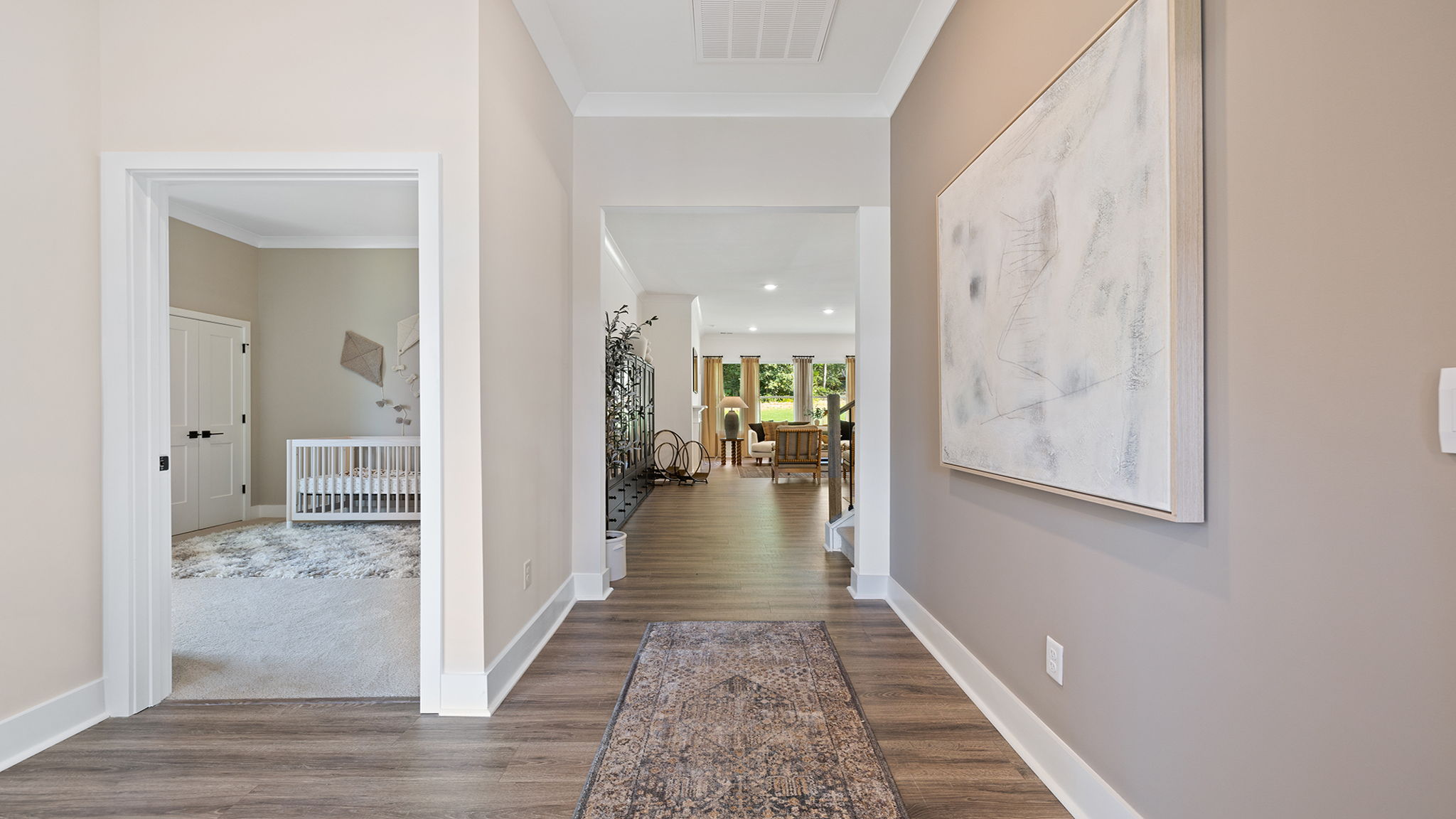 Entry with view of hallway and 2nd bedroom.