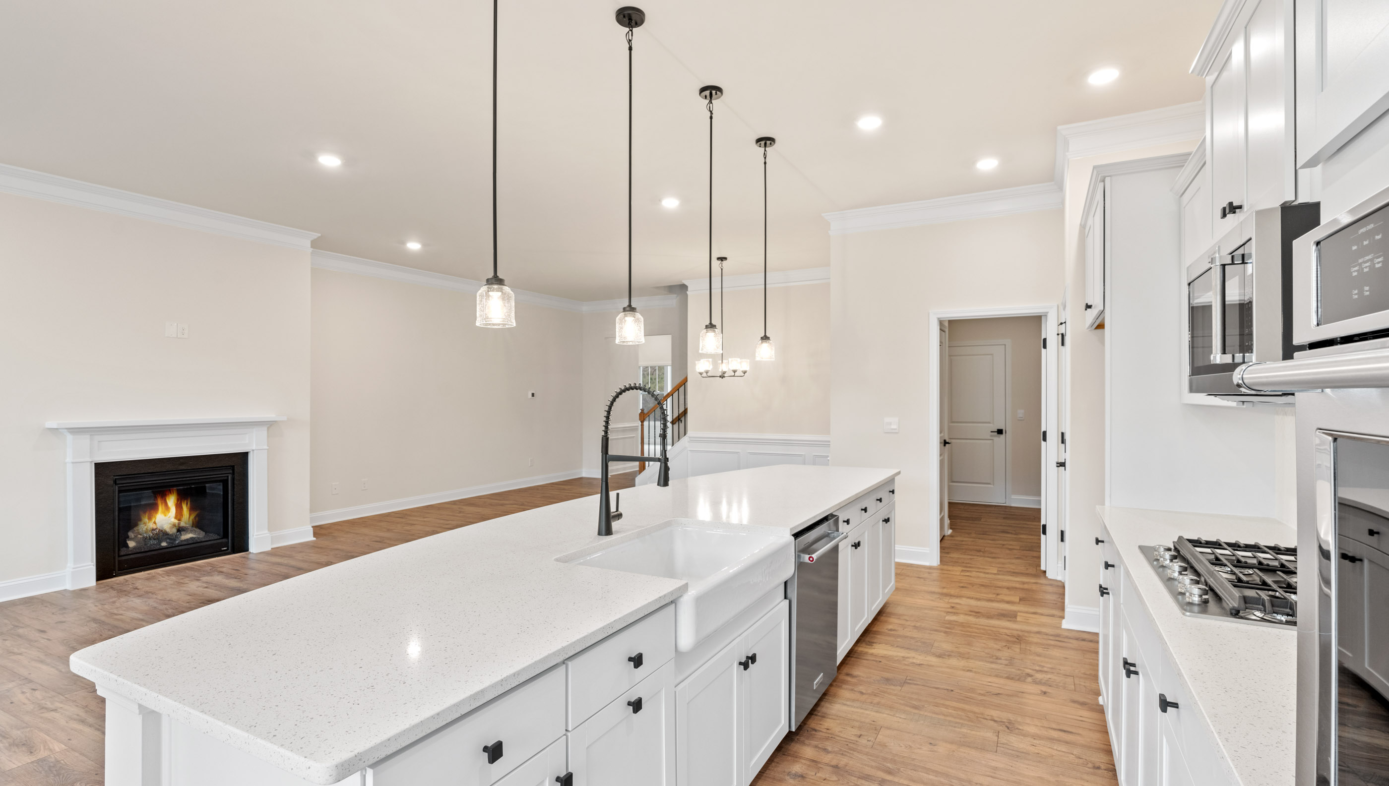 Kitchen and island with granite counter tops.