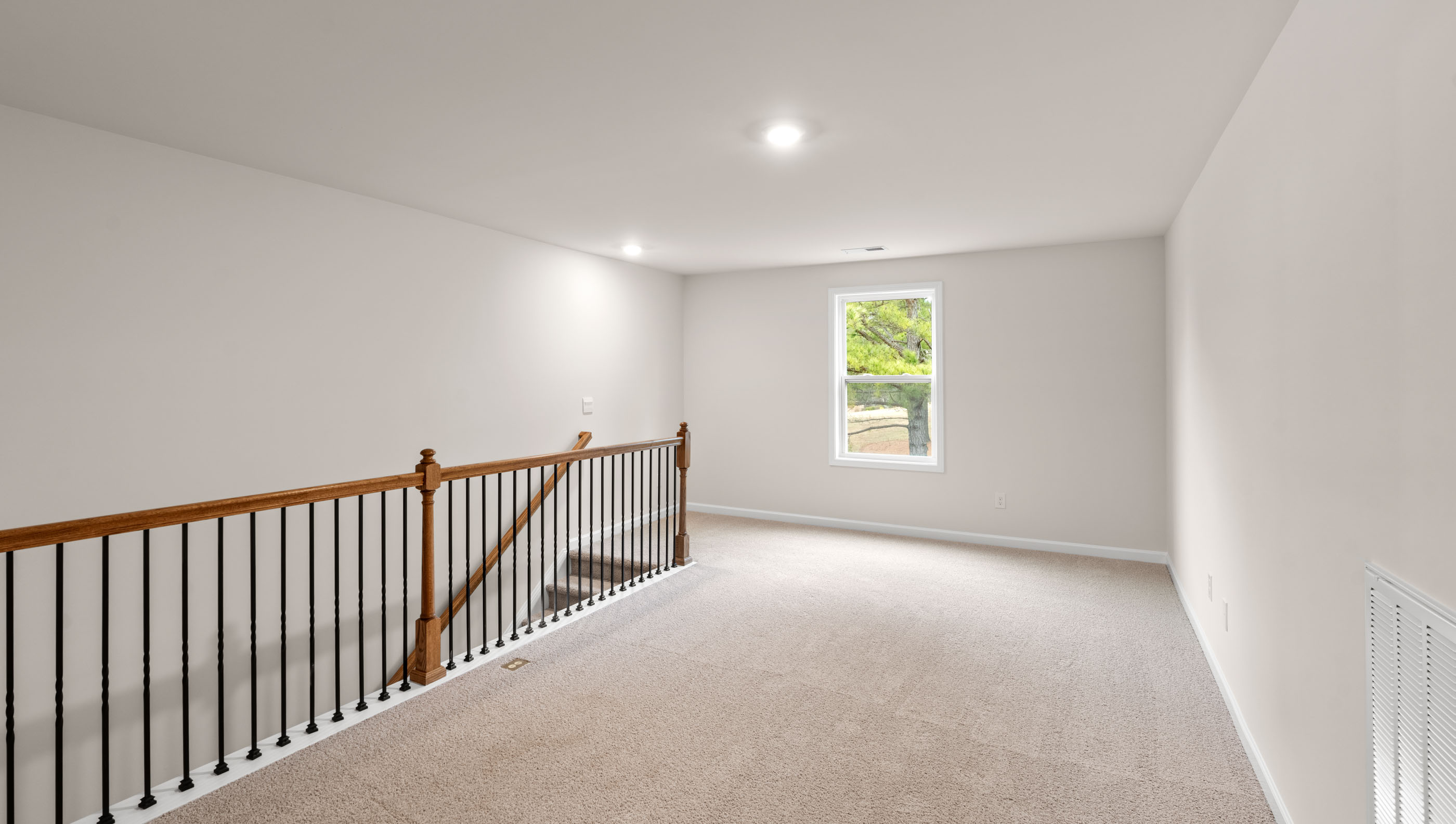Loft area with windows.