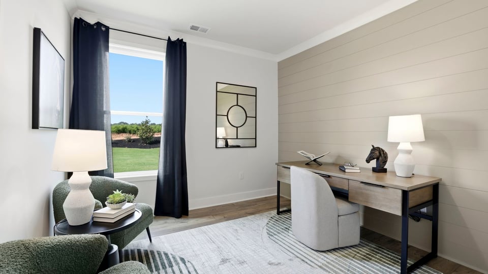 Bedroom with windows and closet.