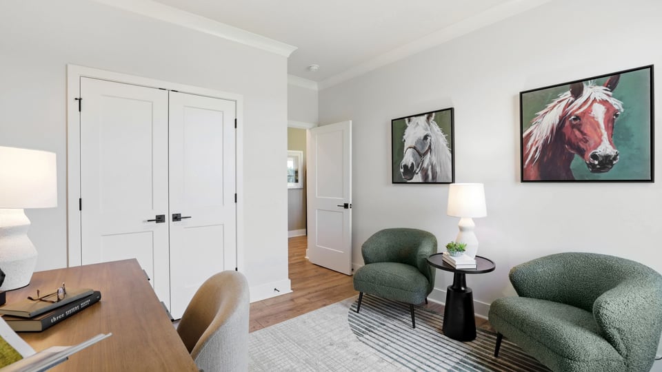 Bedroom with windows and closet.