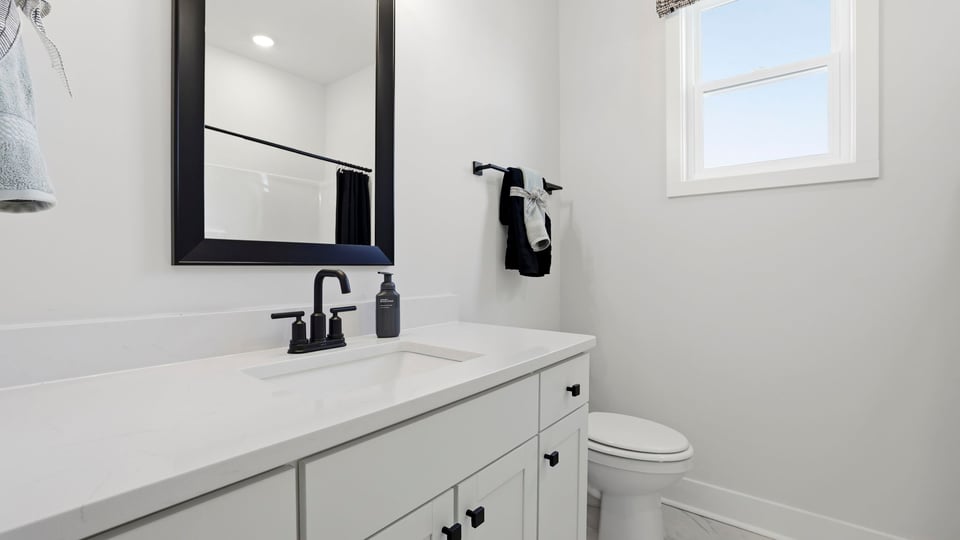 Bathroom with vanity sink.