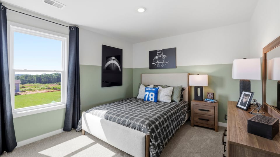 Bedroom with windows and closet.