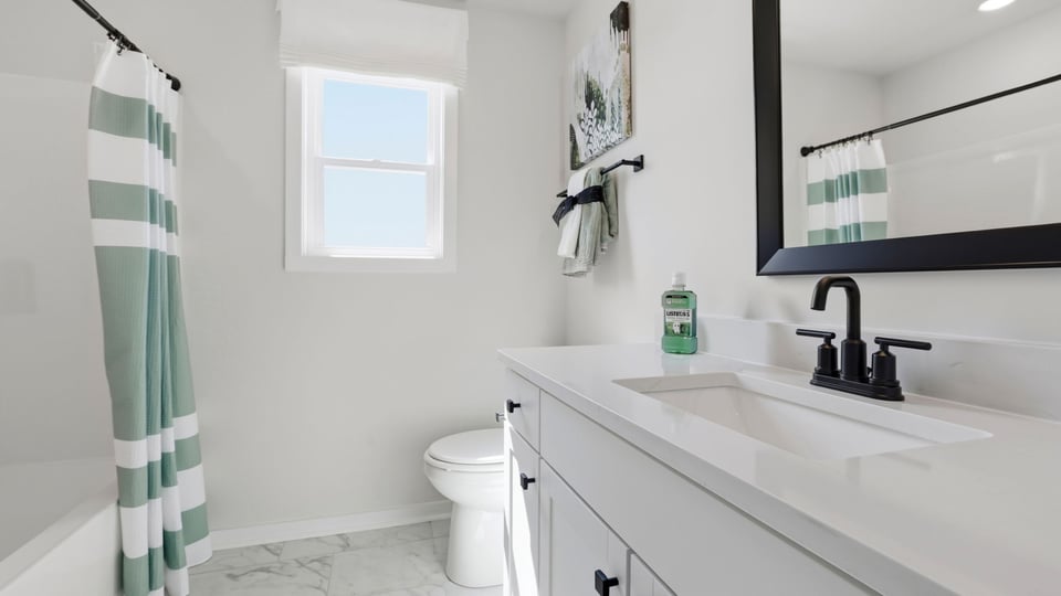Bathroom with vanity sink.