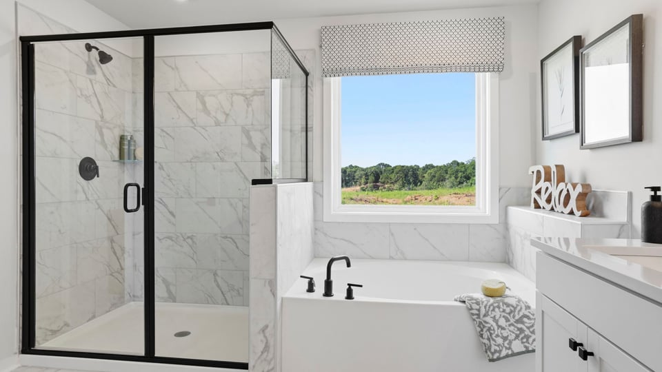 Primary bathroom with double vanity sinks.