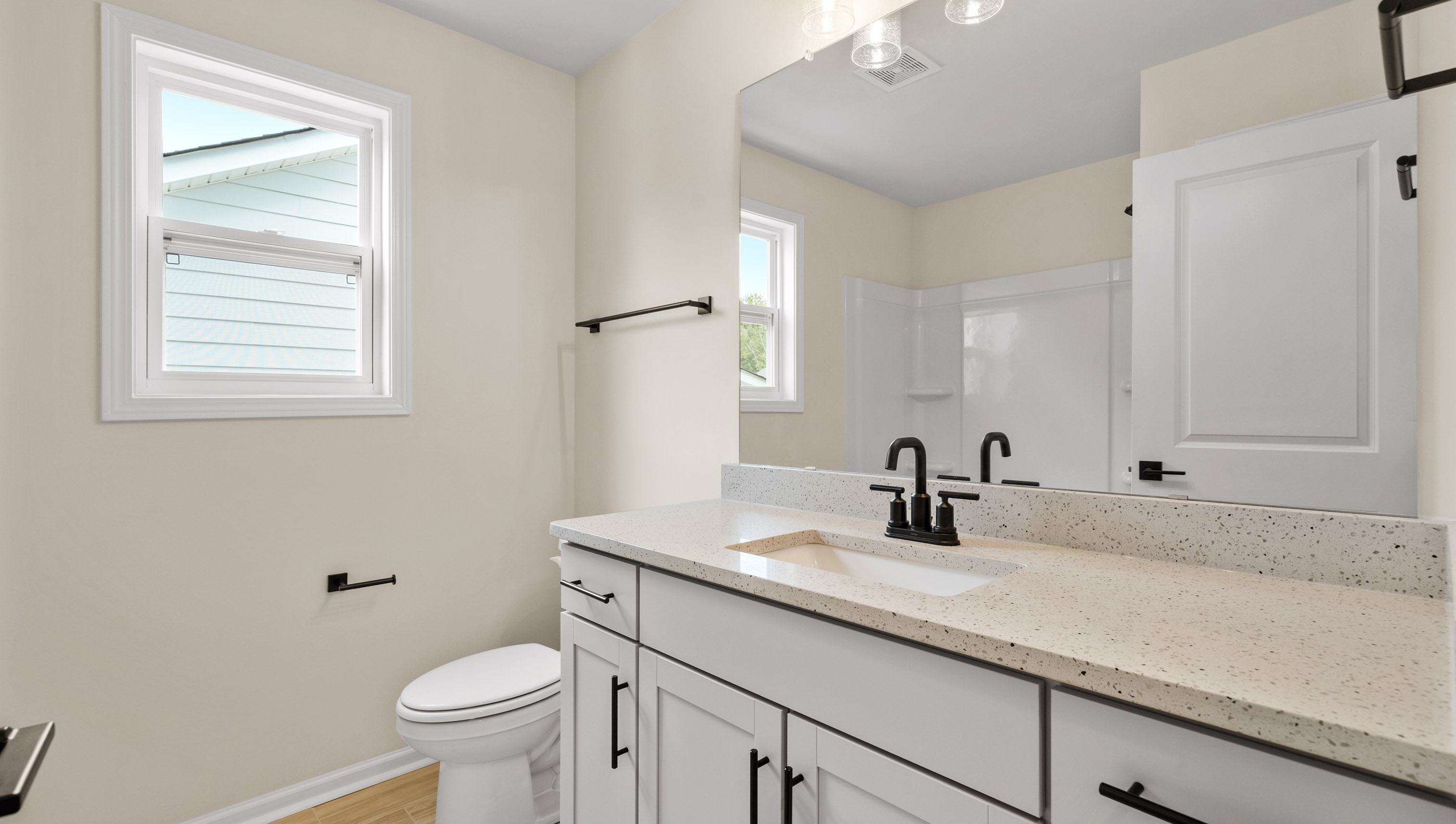 Bathroom with double vanity sink.