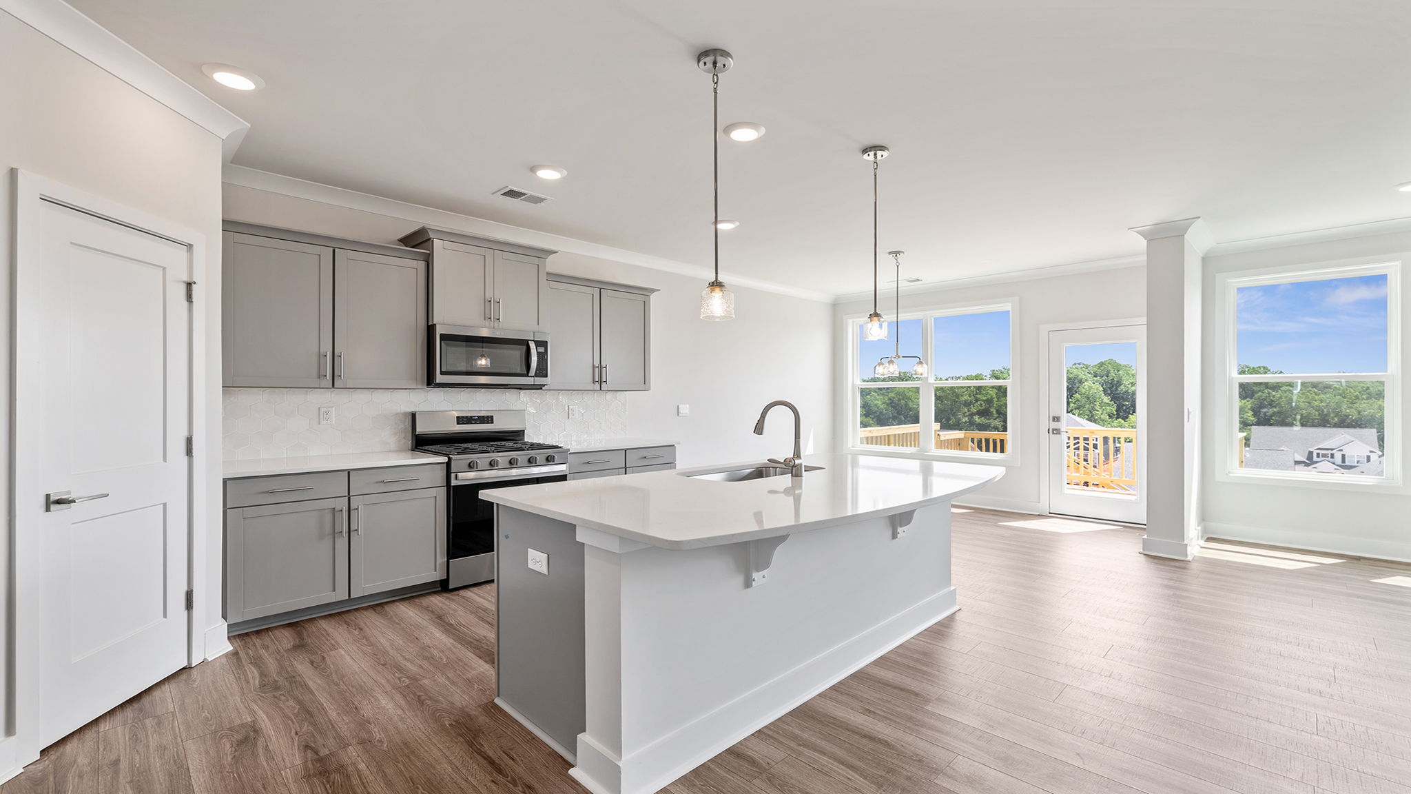 Open floor plan with lots of windows.
