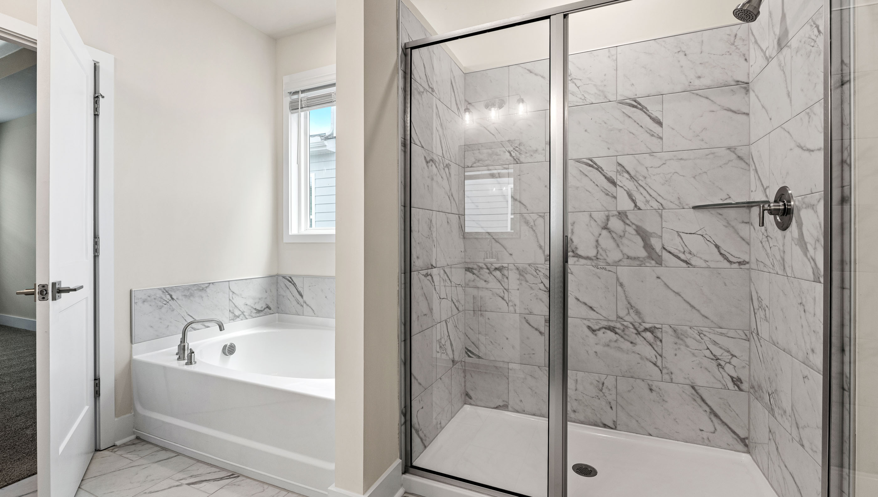 Primary bathroom walk-in shower.