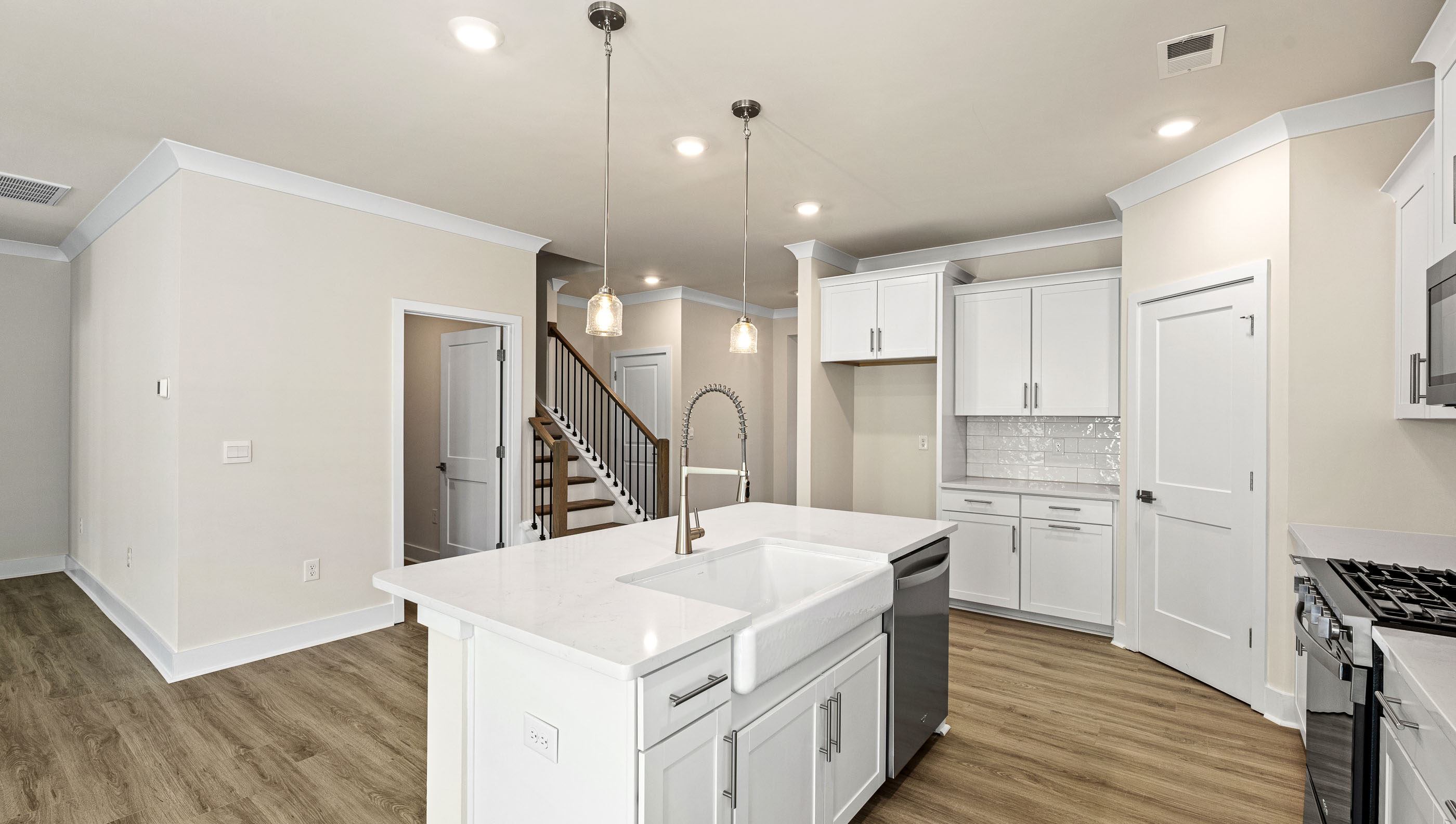 Island hosts the sink and dishwasher.